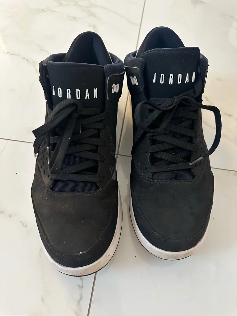 Jordan Black Mid-Top Sneakers with White Sole Accents